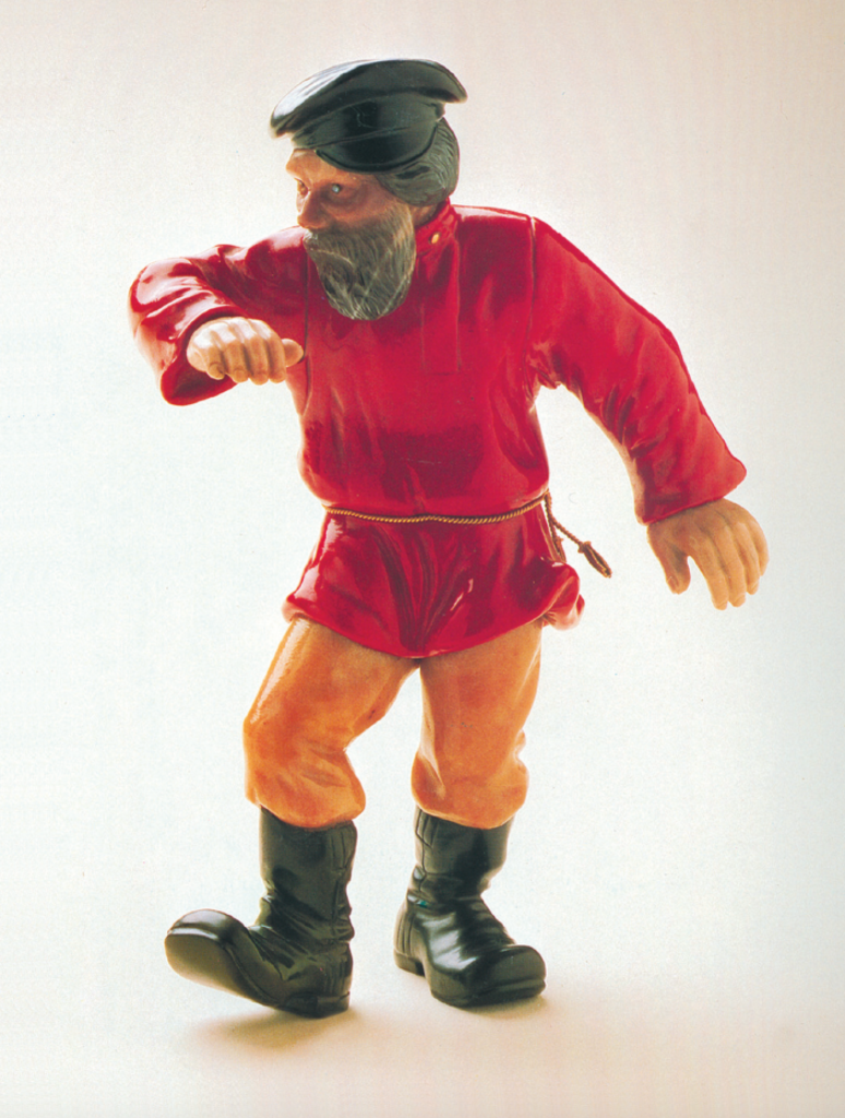 A dancing Moujik by Fabergé (Un Moujik qui danse), circa 1900. Figurine composed of agate, jasper, yellow chalcedony, purpurin, and sapphires (eyes). H. 13.3 cm